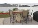 Backyard with firepit and seating for outdoor entertaining at 433 Montego Bay Dr, Mulberry, FL 33860
