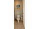 Small bathroom with toilet and tiled floor at 433 Montego Bay Dr, Mulberry, FL 33860