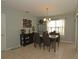 Bright dining room features a table with four chairs and built-in hutch at 433 Montego Bay Dr, Mulberry, FL 33860