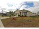 House with palm tree and well-kept lawn at 433 Montego Bay Dr, Mulberry, FL 33860