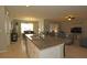 Open kitchen with island and view into living room at 433 Montego Bay Dr, Mulberry, FL 33860