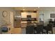 Modern kitchen with stainless steel appliances and granite countertops at 433 Montego Bay Dr, Mulberry, FL 33860