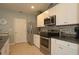 Kitchen with stainless steel appliances and granite countertops at 433 Montego Bay Dr, Mulberry, FL 33860