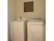 Functional laundry room with washer and dryer at 433 Montego Bay Dr, Mulberry, FL 33860