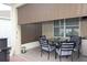 Covered patio with seating and retractable shade at 433 Montego Bay Dr, Mulberry, FL 33860