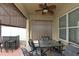 Covered patio with table and chairs, perfect for outdoor dining at 433 Montego Bay Dr, Mulberry, FL 33860