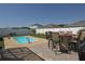 Enjoy outdoor living with a private pool, brick patio, and outdoor dining space at 433 Montego Bay Dr, Mulberry, FL 33860