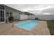 Inviting rectangular pool in a paved backyard at 433 Montego Bay Dr, Mulberry, FL 33860