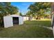 Backyard with shed and fenced-in area at 514 Mohawk Ave, Lakeland, FL 33815