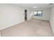 Spacious bedroom with carpeted floor and window at 514 Mohawk Ave, Lakeland, FL 33815