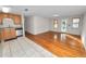 Kitchen with stainless steel appliances, wood floors, and tile at 514 Mohawk Ave, Lakeland, FL 33815