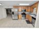 Bright kitchen with stainless steel appliances at 514 Mohawk Ave, Lakeland, FL 33815