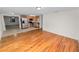 Eat-in kitchen with stainless steel appliances and wood floors at 514 Mohawk Ave, Lakeland, FL 33815