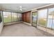 Sunroom with window blinds and carpet floor at 514 Mohawk Ave, Lakeland, FL 33815
