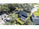 Aerial view of house, pool, and backyard at 5171 Deeson Pointe Ct, Lakeland, FL 33805