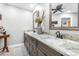 Elegant bathroom with double vanity and granite countertops at 5171 Deeson Pointe Ct, Lakeland, FL 33805