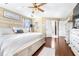 Spacious primary bedroom with large bed and ensuite bathroom access at 5171 Deeson Pointe Ct, Lakeland, FL 33805