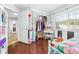 Bright bedroom with a built-in closet and a view at 5171 Deeson Pointe Ct, Lakeland, FL 33805