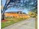 Two-story brick home with a large yard and long driveway at 5171 Deeson Pointe Ct, Lakeland, FL 33805