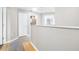 Upper level hallway with access to bedrooms and bathroom at 5171 Deeson Pointe Ct, Lakeland, FL 33805