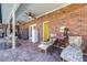 Relaxing patio with seating area and brick columns at 5171 Deeson Pointe Ct, Lakeland, FL 33805