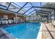 Large screened pool with outdoor kitchen at 5171 Deeson Pointe Ct, Lakeland, FL 33805
