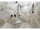 Large walk-in shower with multiple shower heads and tiled walls at 5171 Deeson Pointe Ct, Lakeland, FL 33805