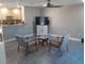 Living room featuring gray walls, tile floors, and mid-century modern furniture at 5235 Nichols E Dr, Lakeland, FL 33812