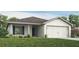 One-story home with a two-car garage and landscaped lawn at 555 Silver Course Run, Ocala, FL 34472