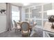 Bright home office features a spacious desk, two chairs, and stylish wall decor at 555 Silver Course Run, Ocala, FL 34472