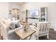 Living room with light colored sofa and coffee table at 555 Silver Course Run, Ocala, FL 34472