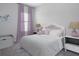 bedroom with light decor and stuffed animal at 557 Silver Course Run, Ocala, FL 34472