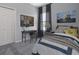 Bright bedroom with a desk, bed, and window at 557 Silver Course Run, Ocala, FL 34472