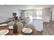 Dining area with kitchen and living room views at 557 Silver Course Run, Ocala, FL 34472