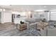 Open concept living area with kitchen and island at 557 Silver Course Run, Ocala, FL 34472