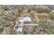 Aerial view of a house with a pool and large backyard at 5576 Albert Williams Rd, Mulberry, FL 33860