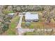 Property boasts a large house, detached garage and spacious grounds at 5576 Albert Williams Rd, Mulberry, FL 33860
