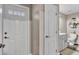 Clean bathroom with a toilet, sink, and linen closet at 5576 Albert Williams Rd, Mulberry, FL 33860