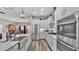 Modern kitchen with stainless steel appliances and marble countertops at 5576 Albert Williams Rd, Mulberry, FL 33860