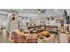 Spacious living room boasts a large sectional sofa and a cozy armchair at 5576 Albert Williams Rd, Mulberry, FL 33860