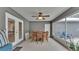 Relaxing screened patio with table, chairs, and access to the pool at 5576 Albert Williams Rd, Mulberry, FL 33860