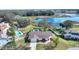 Single-story home with pool and lakefront view at 6004 Greenleaf Cir, Winter Haven, FL 33884