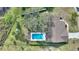 Home with a large backyard, pool, and lush landscaping at 6004 Greenleaf Cir, Winter Haven, FL 33884