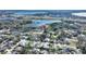 Aerial view showing home's location near a lake at 6004 Greenleaf Cir, Winter Haven, FL 33884