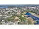 Aerial view showing home's location near a lake at 6004 Greenleaf Cir, Winter Haven, FL 33884