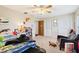 Serene bedroom with a bed, seating, and built-in shelving at 6004 Greenleaf Cir, Winter Haven, FL 33884
