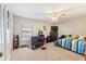 Bright bedroom with a comfortable bed and seating area at 6004 Greenleaf Cir, Winter Haven, FL 33884