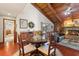 Bright dining area with a wooden table and view into living room at 6004 Greenleaf Cir, Winter Haven, FL 33884