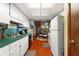 Clean kitchen with green countertops and white appliances at 6004 Greenleaf Cir, Winter Haven, FL 33884