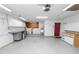 Spacious garage with ample storage and workbench at 7101 Scenic Pl, Lakeland, FL 33810